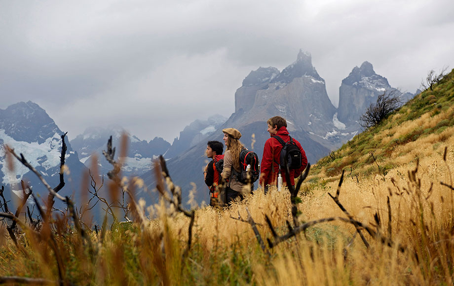 People trekking in search of Pumas in Patagonia Chile at Explora Lodge