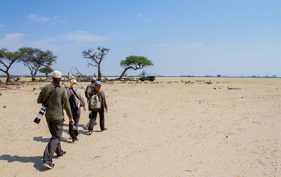 James walking in Hwange National Park in Zambia