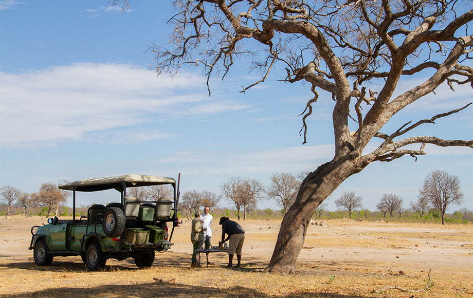 James in Hwange National park enjoying morning tea