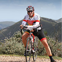 Steve Steve riding bike through Cape Argus