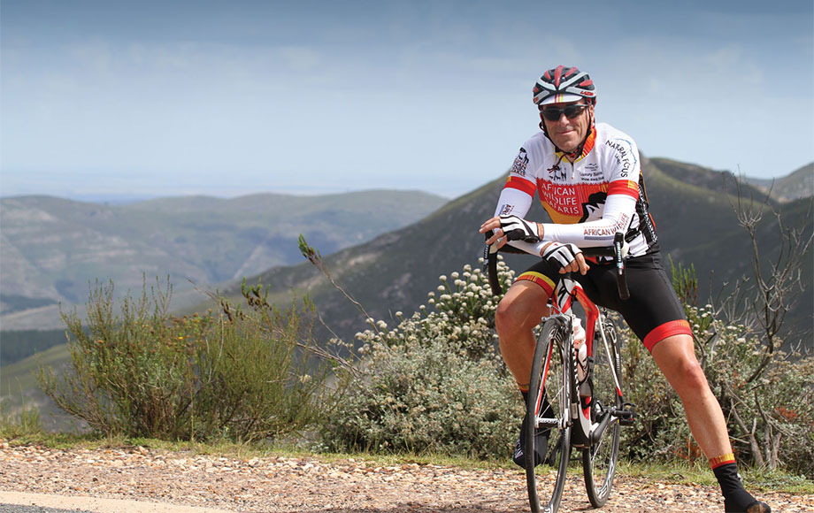 Steve riding bike through Cape Argus