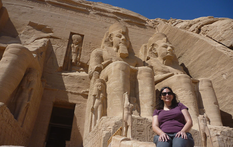 Natasha standing in front of Abu Simbel in Egypt