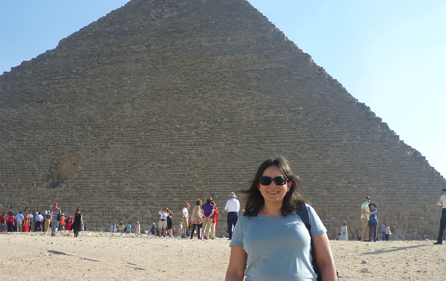 Natasha standing in front of the Pyramids in Egypt