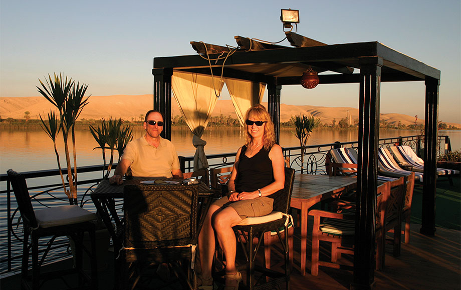 Sara and Steve sitting on a Dahabiya on the River Nile