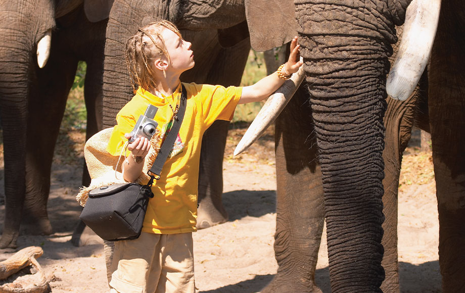 Jeremy with an elephant in Africa