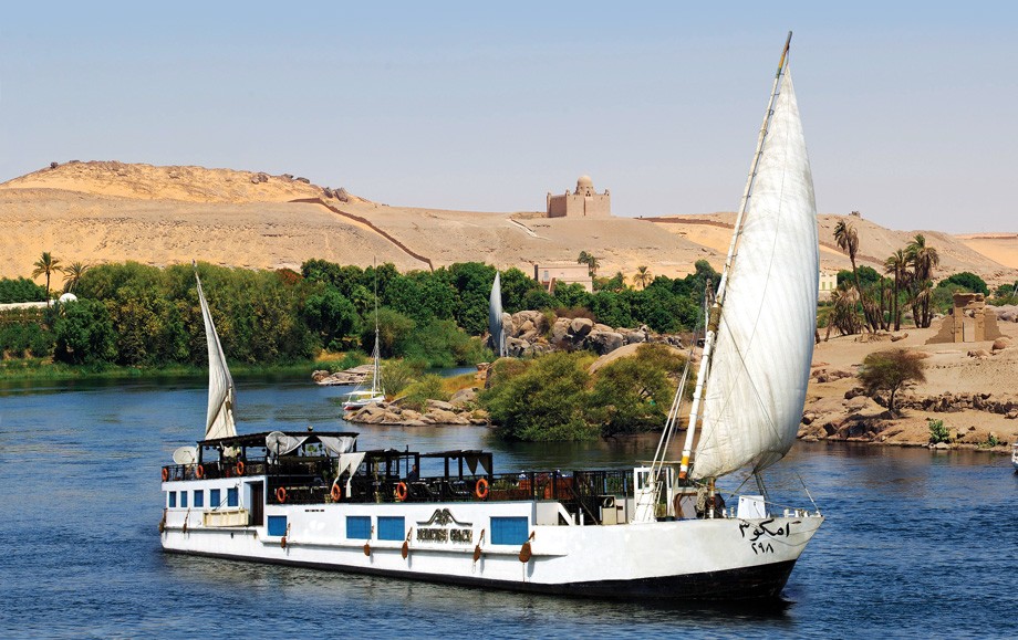 A Dahabiya on the Nile in Aswan near Philae Temple